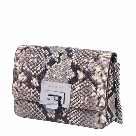 Michael Kors Handbags - Authentic Michael Kors leather studs Crosby/clutch